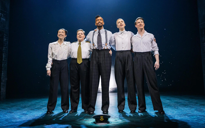 Cast of Operation Mincemeat performing on Broadway stage.