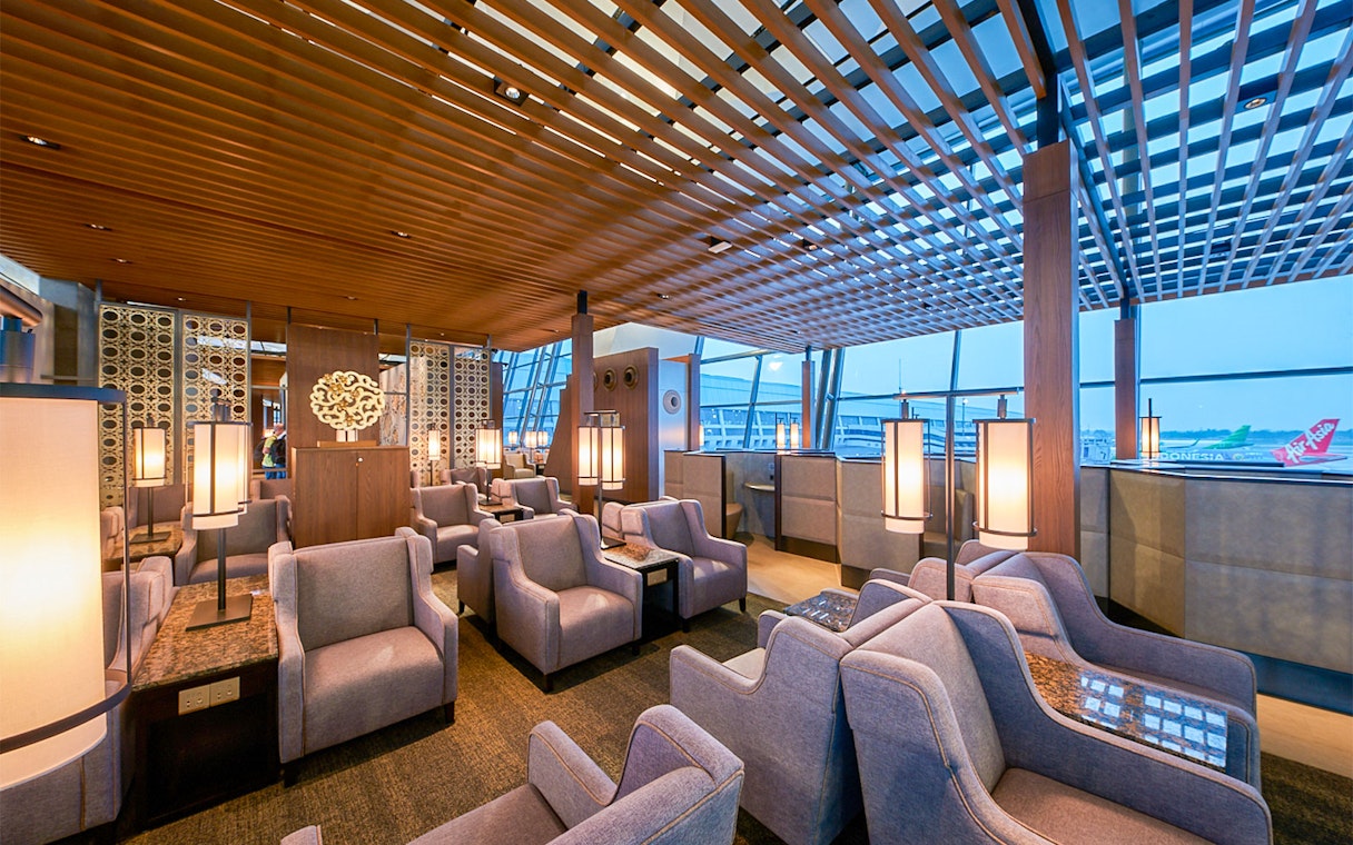 Sapphire Lounge seating area, T3 International Departures, near Gate 7, with modern decor and large windows.