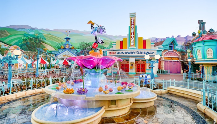 Fountain and colorful buildings in Mickey's Toontown, Disneyland Park, California.