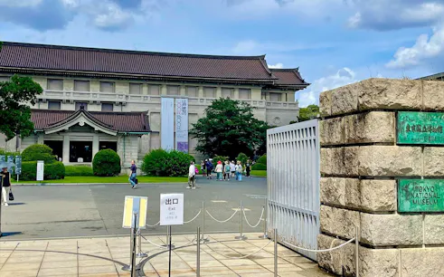Tokyo National Museum entrance in Ueno Park with visitors on a private tour.