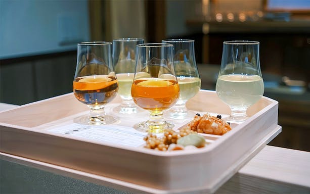 Glasses of assorted teas on a tray at Private Tea Ceremony & Seasonal Wagashi Experience.
