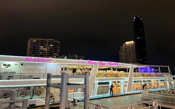 River Star Princess cruise ship docked at night on Chao Phraya River, Bangkok.