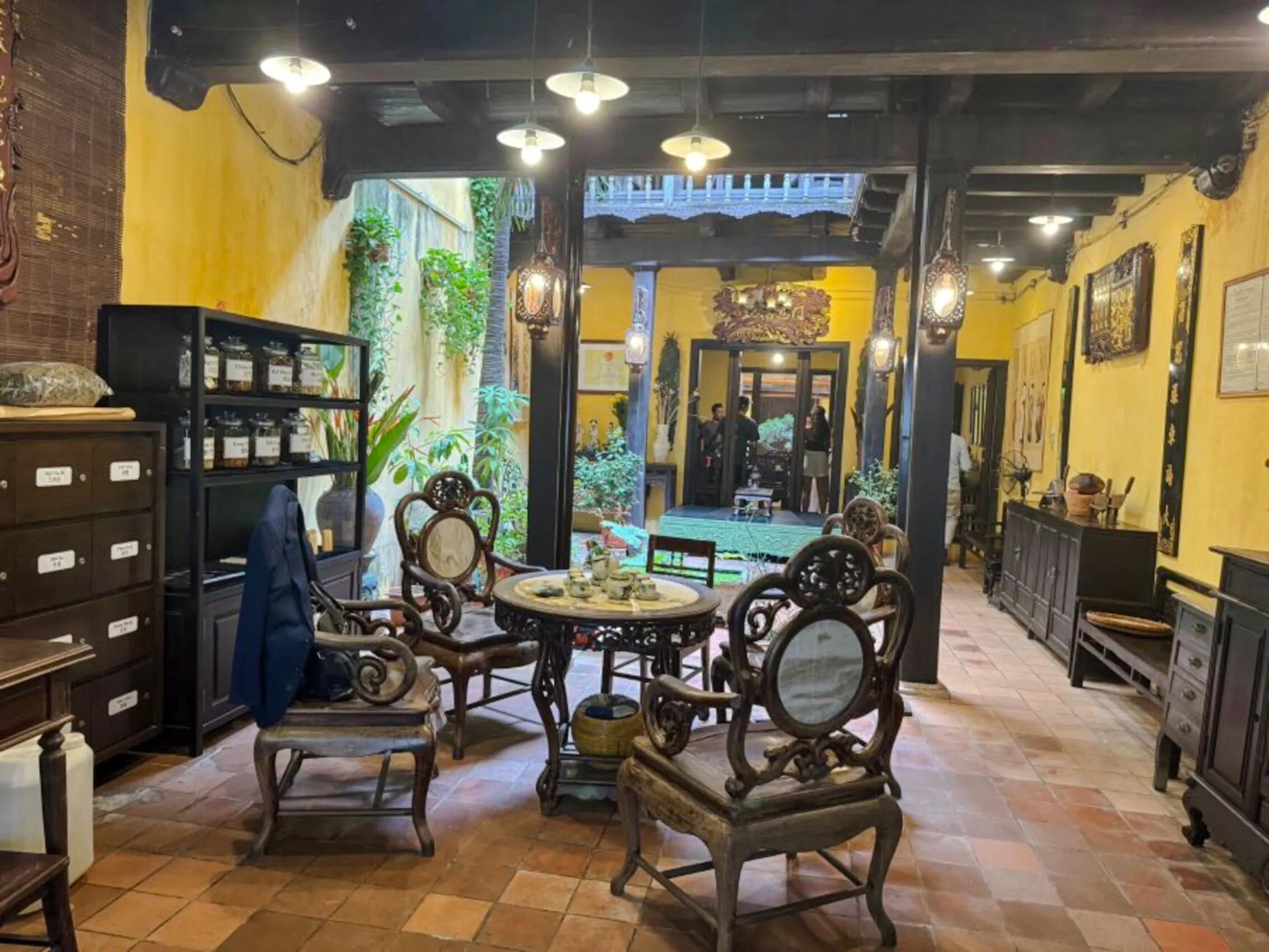 Traditional Vietnamese tea room with antique furniture in Hanoi.
