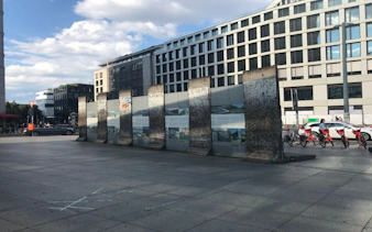 Berlin Wall remnants at Potsdamer Platz during self-guided city exploration game.