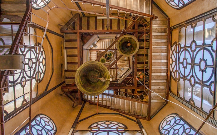 Santiago Cathedral Bell Tower interior with visible bells and staircases.