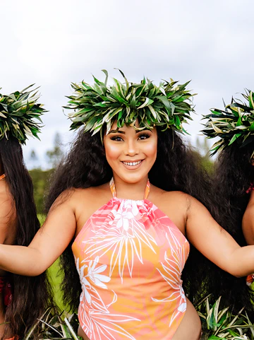 Dancer in traditional attire at Mauka Warriors Luau, Hawaii.