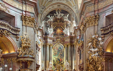 St. Peter's Church ornate interior with baroque decorations, Vienna concert venue.