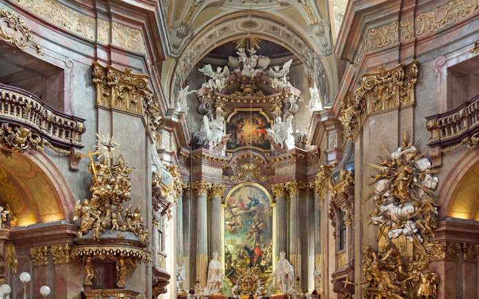 St. Peter's Church ornate interior with baroque decorations, Vienna concert venue.