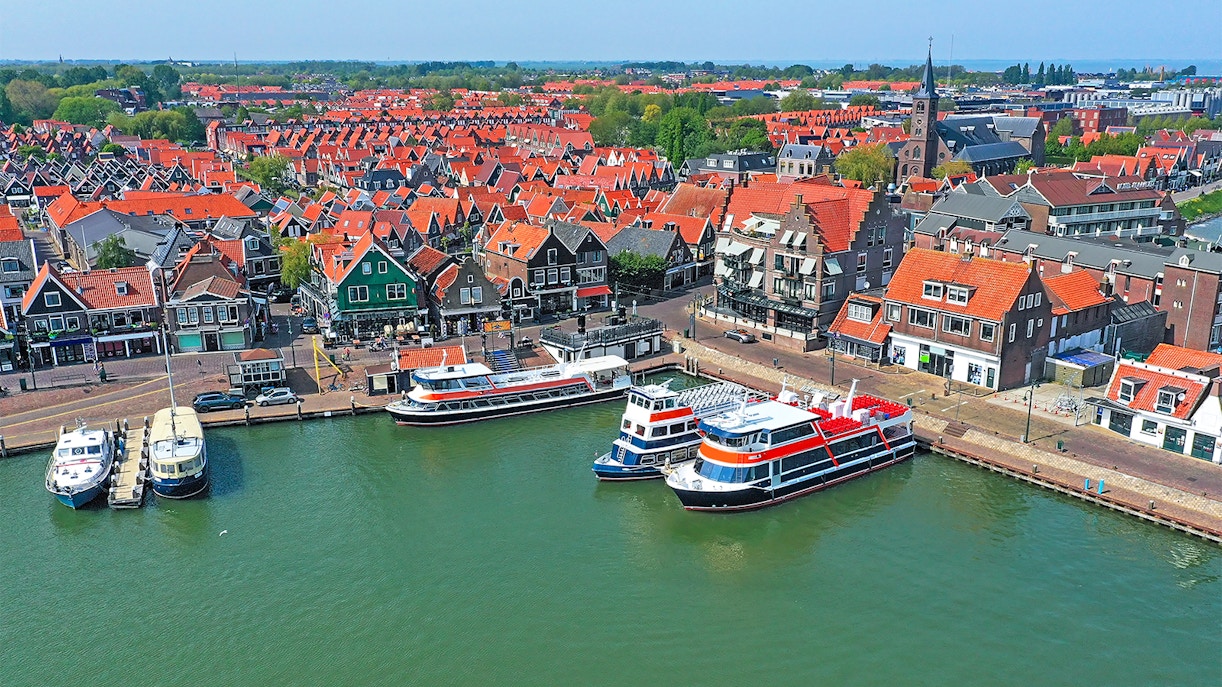 Zaanse Schans windmills and traditional Dutch houses on full-day tour from Amsterdam.