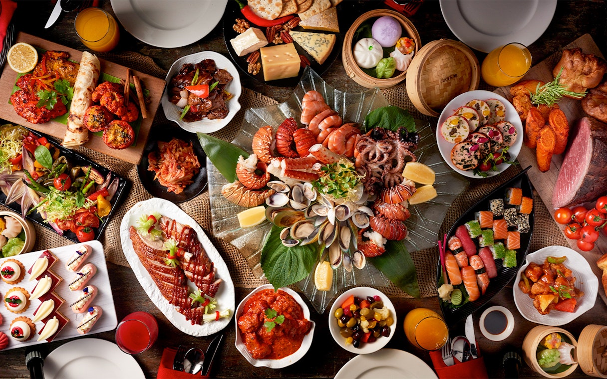 Dinner buffet spread at Atlantis the Palm featuring seafood, sushi, and international dishes.