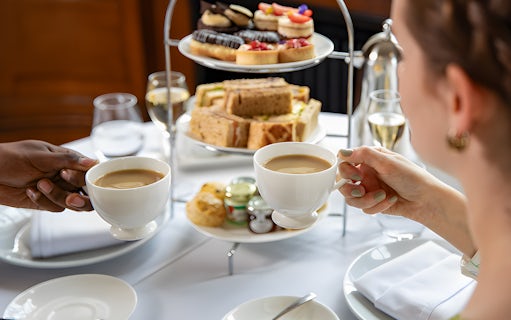 Afternoon tea with pastries and sandwiches at the London Eye.