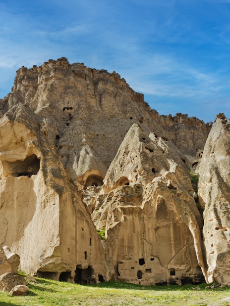 Selime Monastery rock formations in Cappadocia, Turkey, with carved cave dwellings.