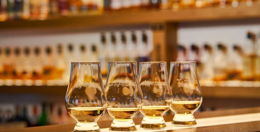 Four glasses of whiskey for tasting at A Taste of Scotland experience.