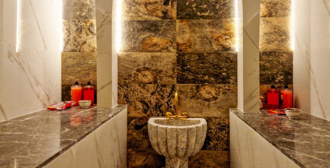 Gedikpasa Historical Hammam interior with traditional spa treatment setup.