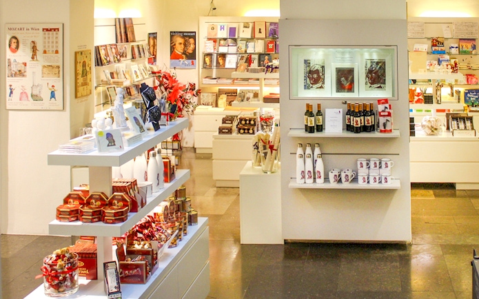 Mozarthaus Vienna gift shop with Mozart-themed souvenirs and books on display.