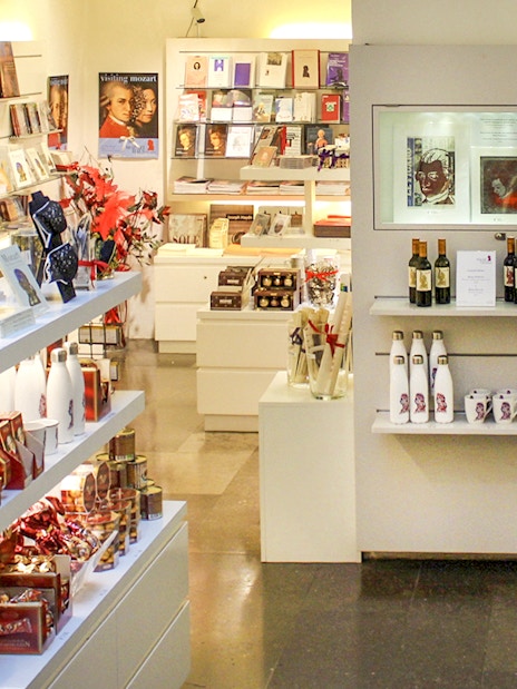 Mozarthaus Vienna gift shop with Mozart-themed souvenirs and books on display.