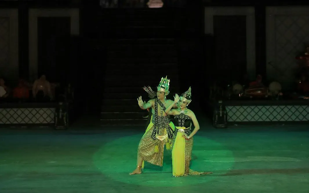 Traditional dancers performing at Prambanan Temple, Indonesia.