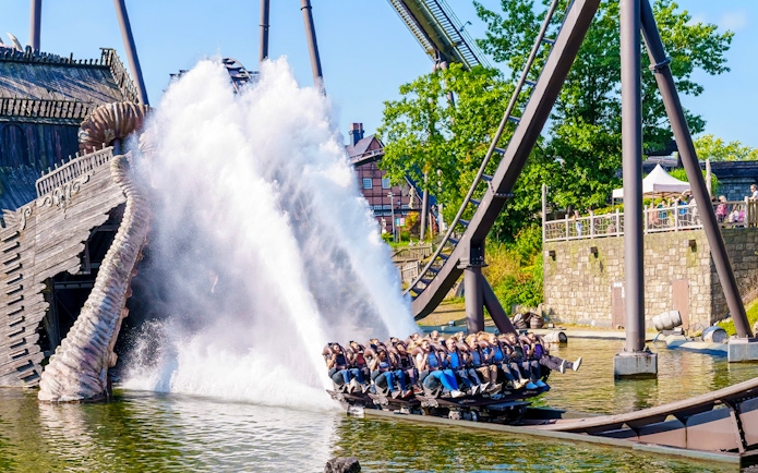 Roller coaster splashing into water at Heide Park, Germany.