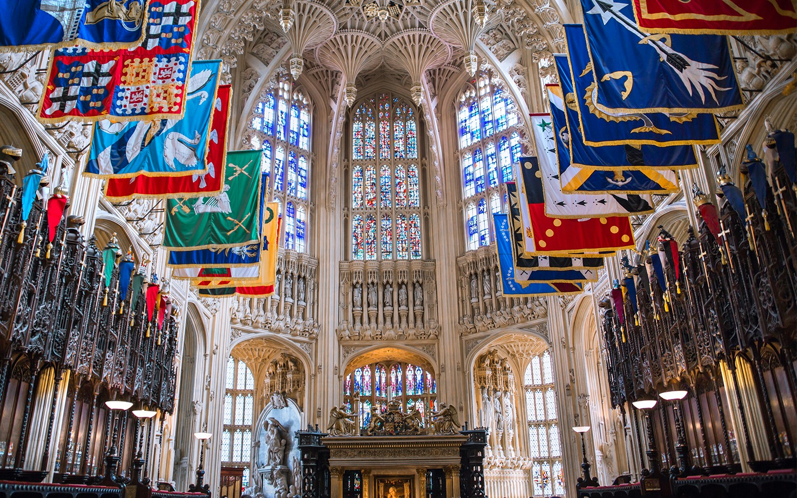Henry VII Lady Chapel interior with colorful banners, Westminster Abbey, London.