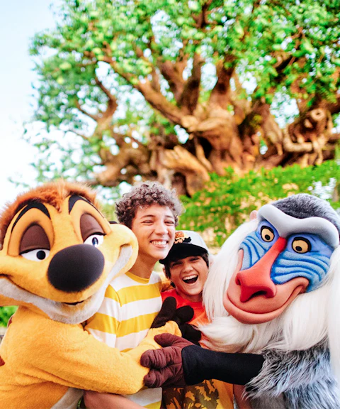 Kids hugging Lion King characters at Animal Kingdom, Walt Disney World, Orlando.