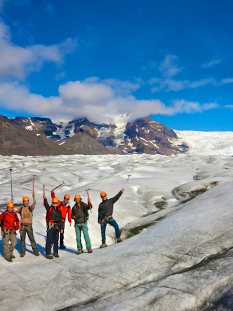 Guests hiking and ice climbing on a glacier in Skaftafell, Iceland.