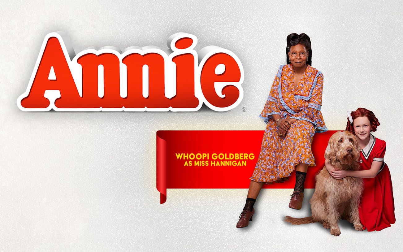 Annie musical poster with cast members and dog.