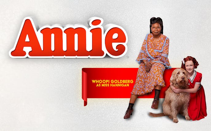 Annie musical poster with cast members and dog.