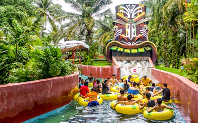 Visitors enjoying a water ride at A'Famosa Melaka Waterpark, Malaysia.