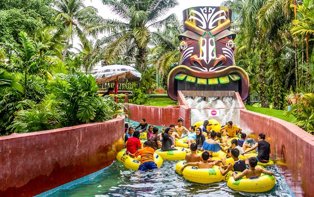 Visitors enjoying a water ride at A'Famosa Melaka Waterpark, Malaysia.