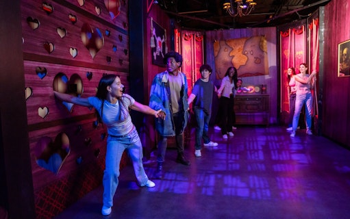Visitors exploring OnePiece Play at Netflix House in Philadelphia.