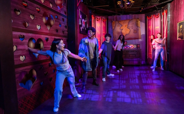 Visitors exploring OnePiece Play at Netflix House in Philadelphia.