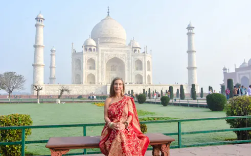 Taj Mahal with visitor in traditional attire, Agra Express Entry Tour.