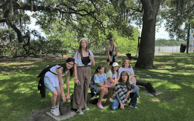 Group exploring Savannah park during self-guided pirate-themed city game.