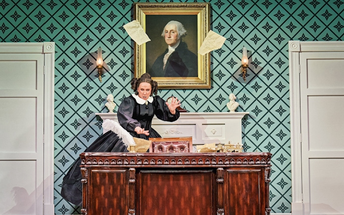 Stage scene from Oh, Mary Westend show with actor at ornate desk.