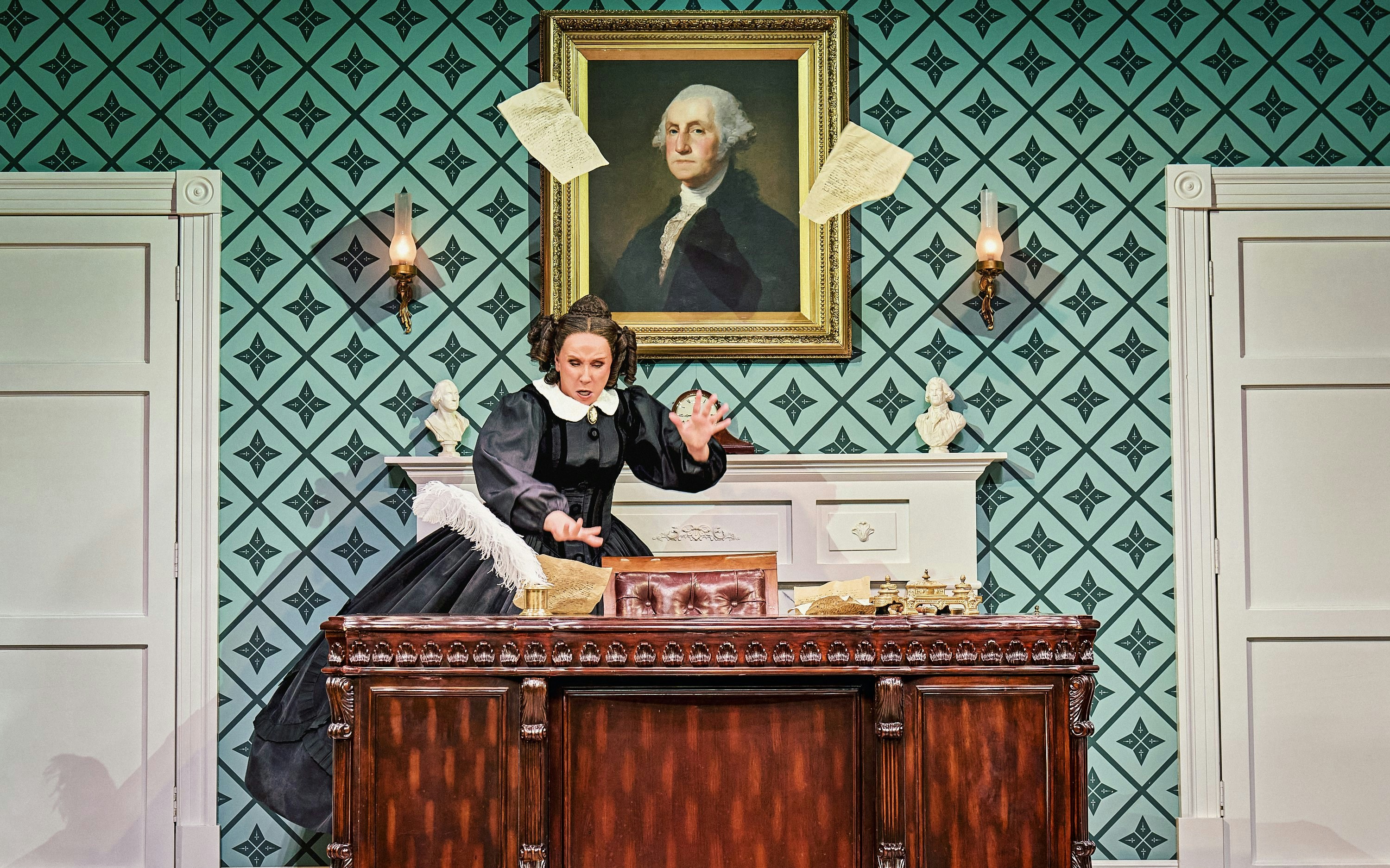Stage scene from Oh, Mary Westend show with actor at ornate desk.