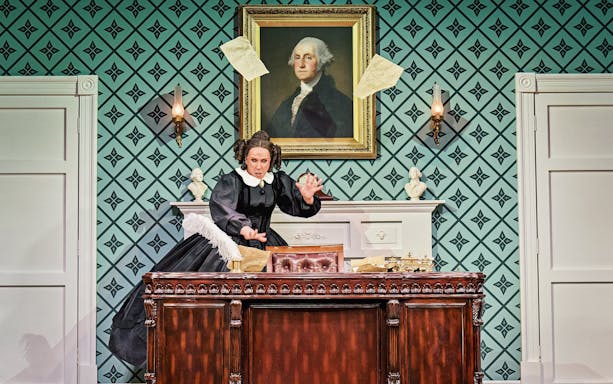 Stage scene from Oh, Mary Westend show with actor at ornate desk.