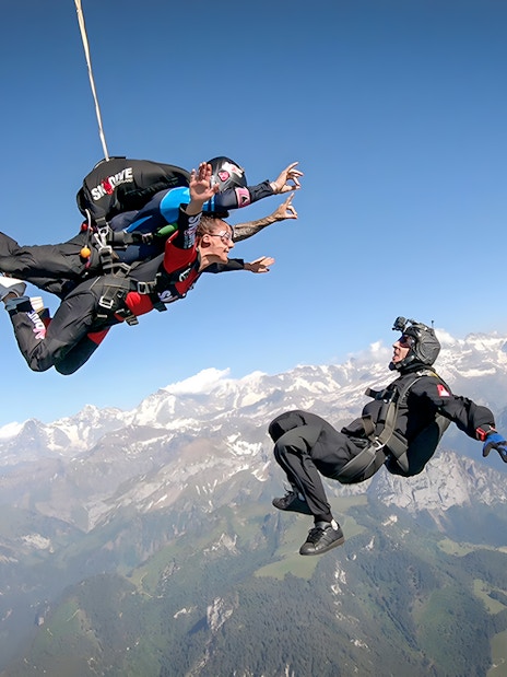 Tandem skydive over Swiss Alps from 13,000 ft with instructor and breathtaking mountain views.