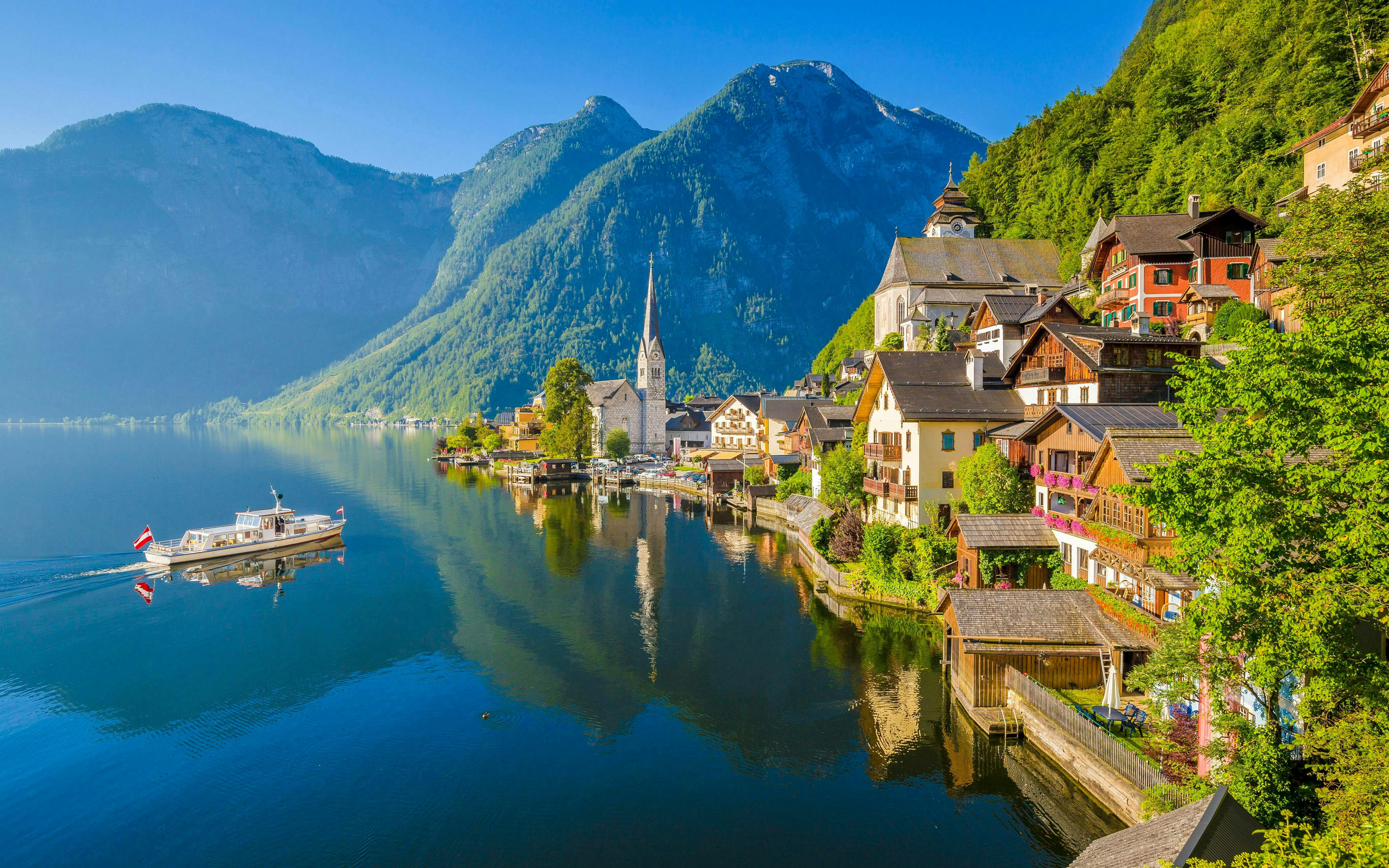 Lakeside view of Hallstatt with Lutheran Church and mountains, Austria.