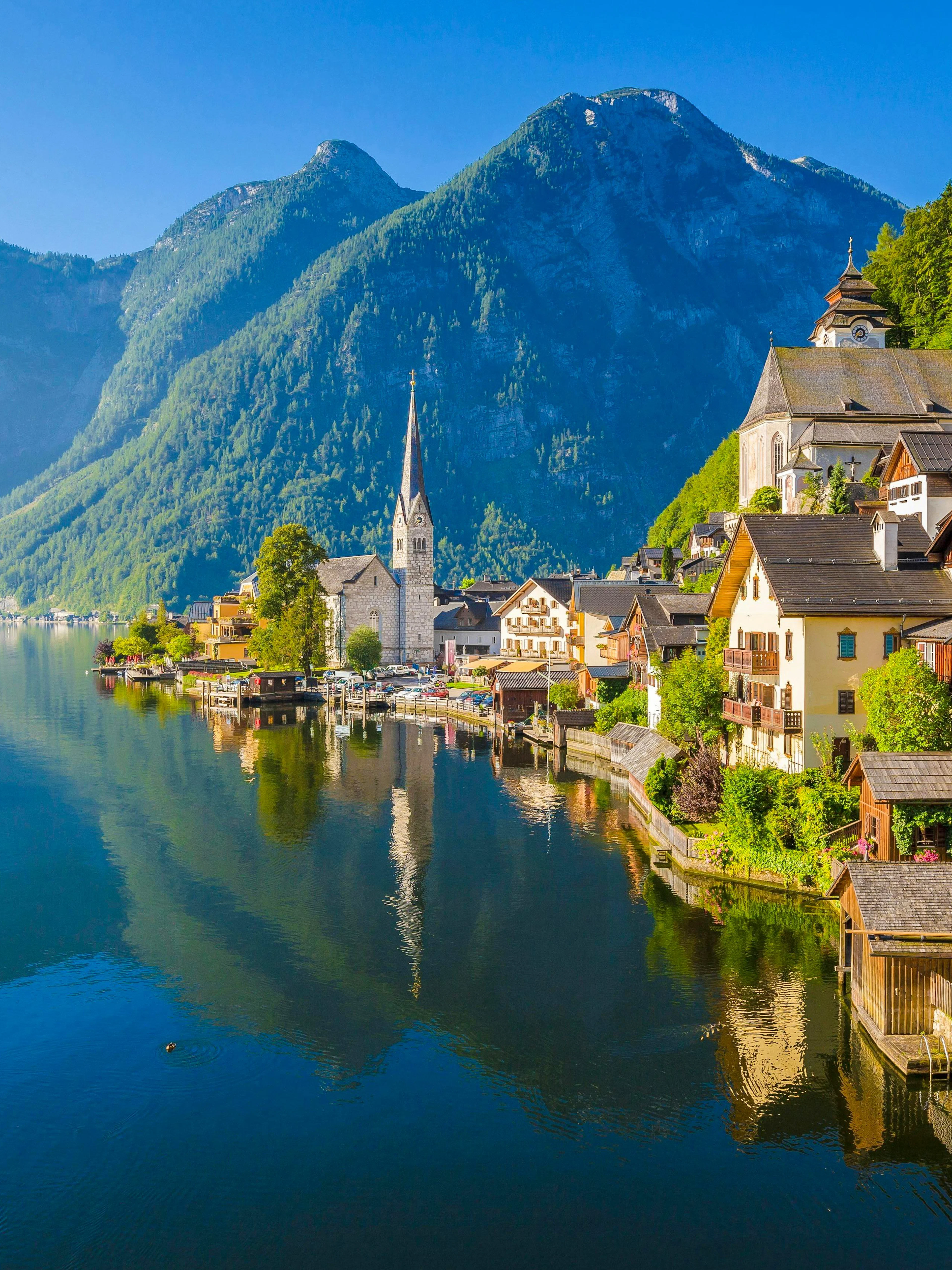 Lakeside view of Hallstatt with Lutheran Church and mountains, Austria.