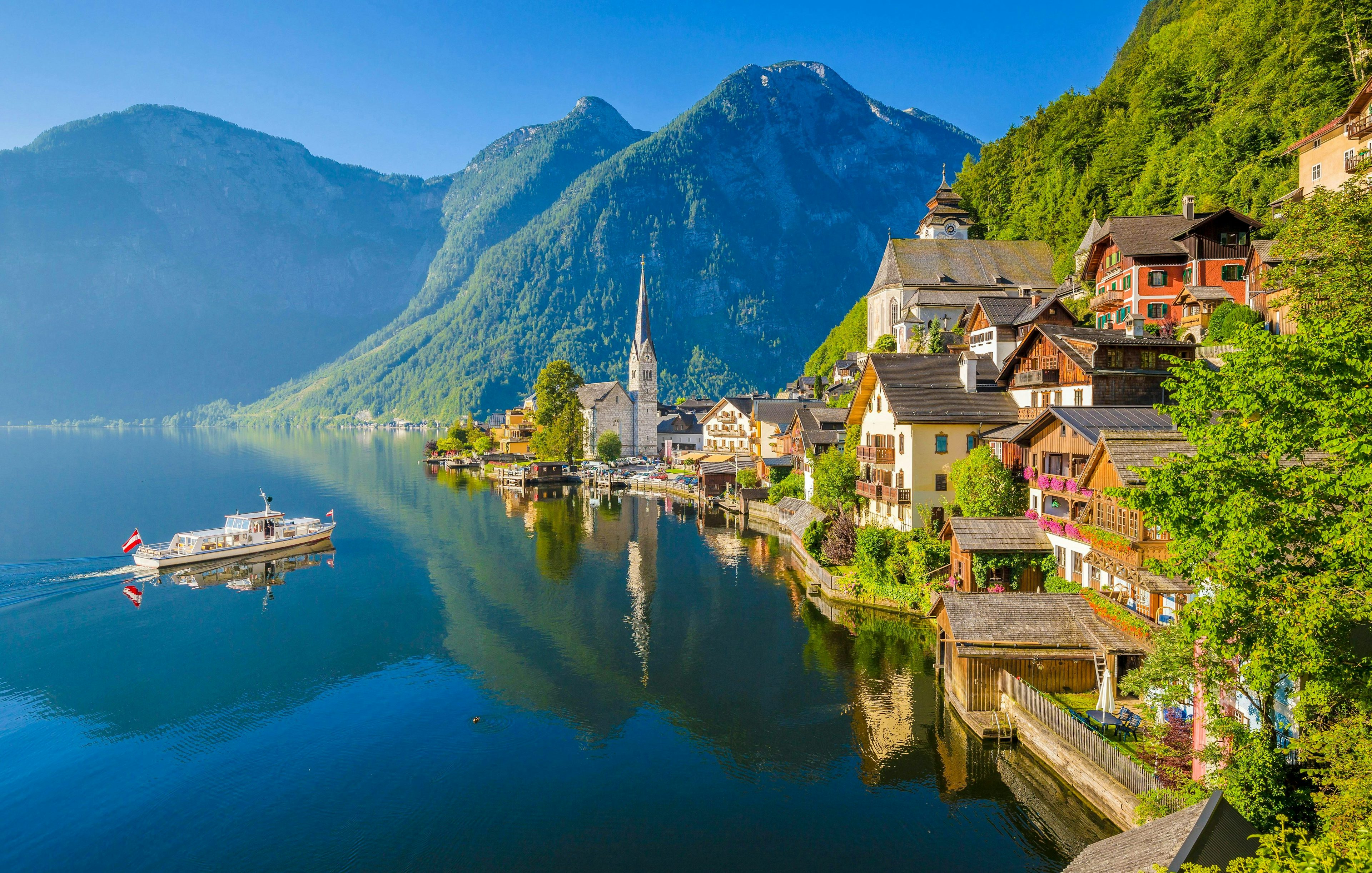 Lakeside view of Hallstatt with Lutheran Church and mountains, Austria.