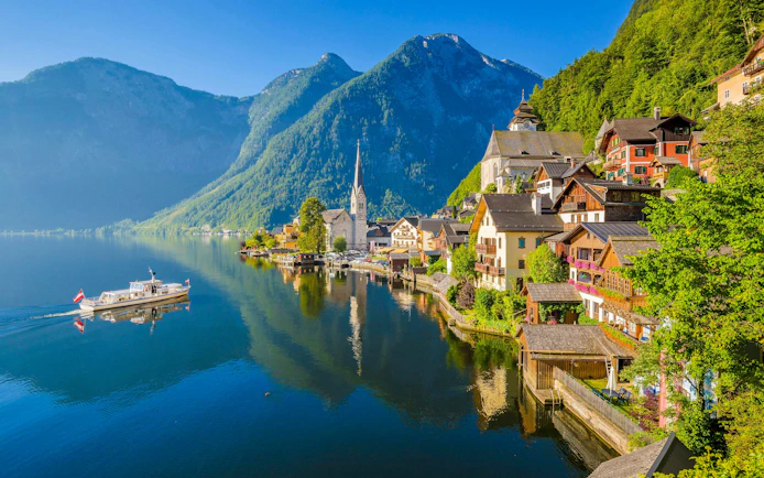 Lakeside view of Hallstatt with Lutheran Church and mountains, Austria.