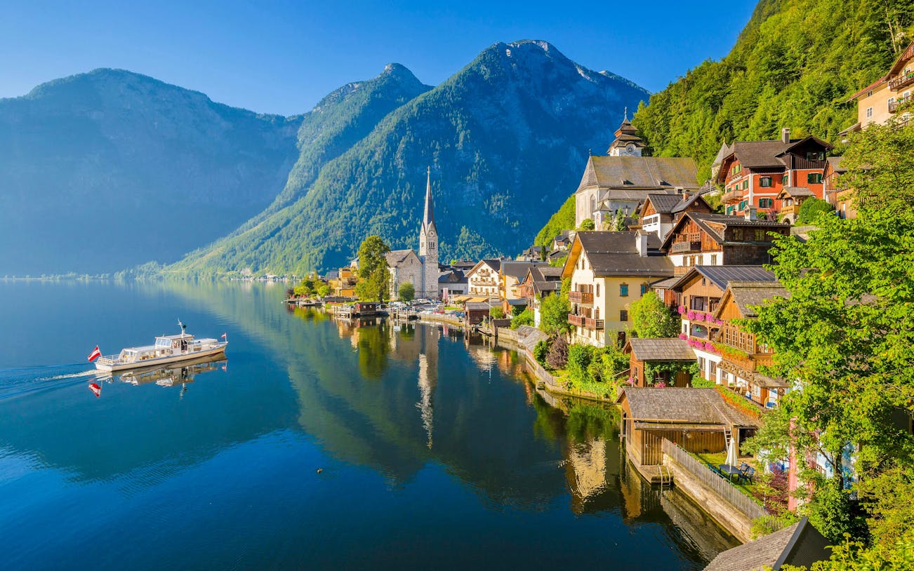 Lakeside view of Hallstatt with Lutheran Church and mountains, Austria.