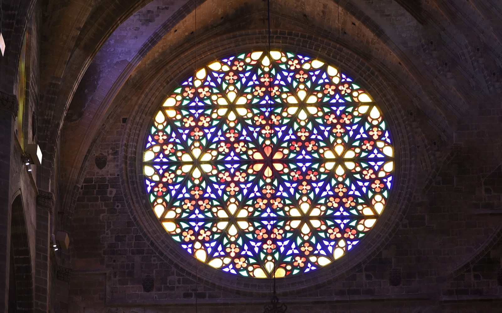 Colourful stained glass Rose Window in Palma Cathedral