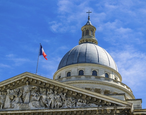 Dome of Paris Pantheon with intricate architectural details in Paris, France.