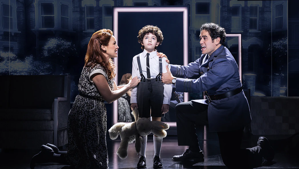 Child with parents in a scene from The Who’s Tommy musical.