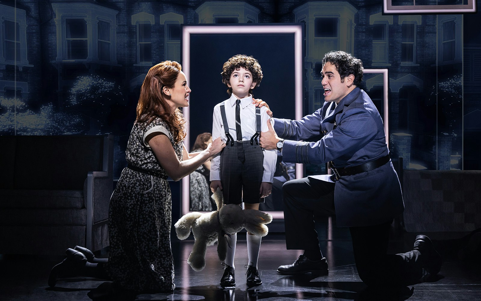 Child with parents in a scene from The Who’s Tommy musical.