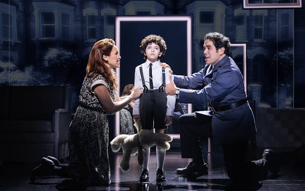 Child with parents in a scene from The Who’s Tommy musical.