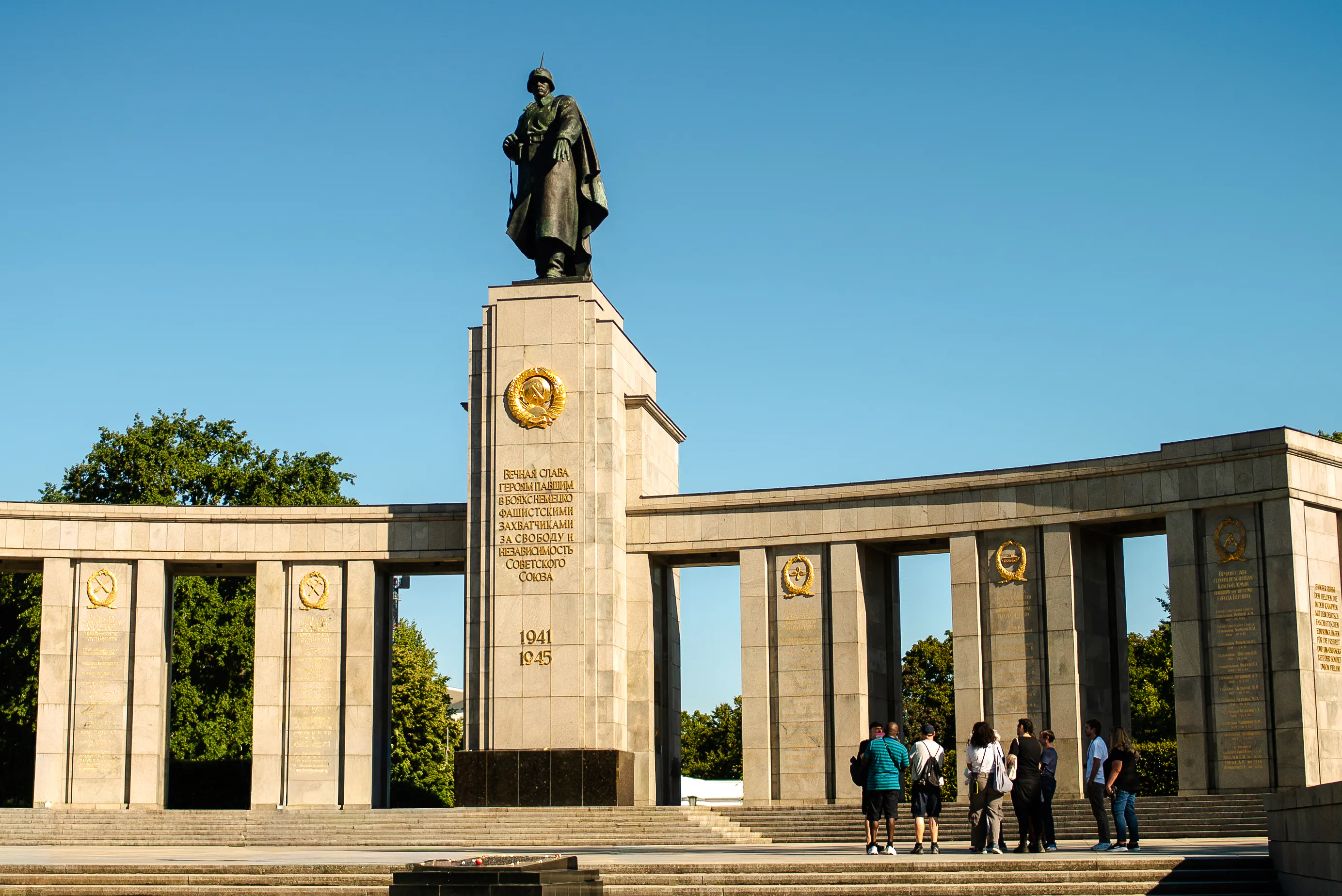 Soviet War Memorial in Berlin with tourists on a walking tour.