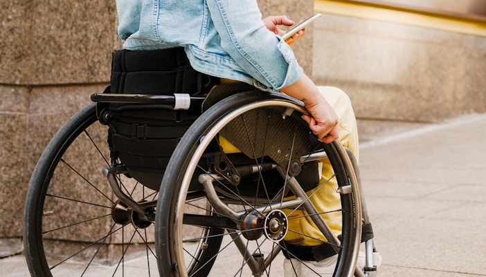 Girl in a wheelchair.