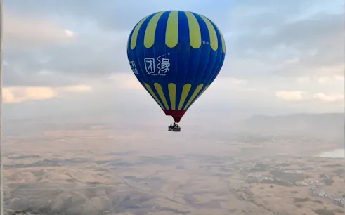 Hot air balloon over Ihlara Canyon at sunrise, Cappadocia.